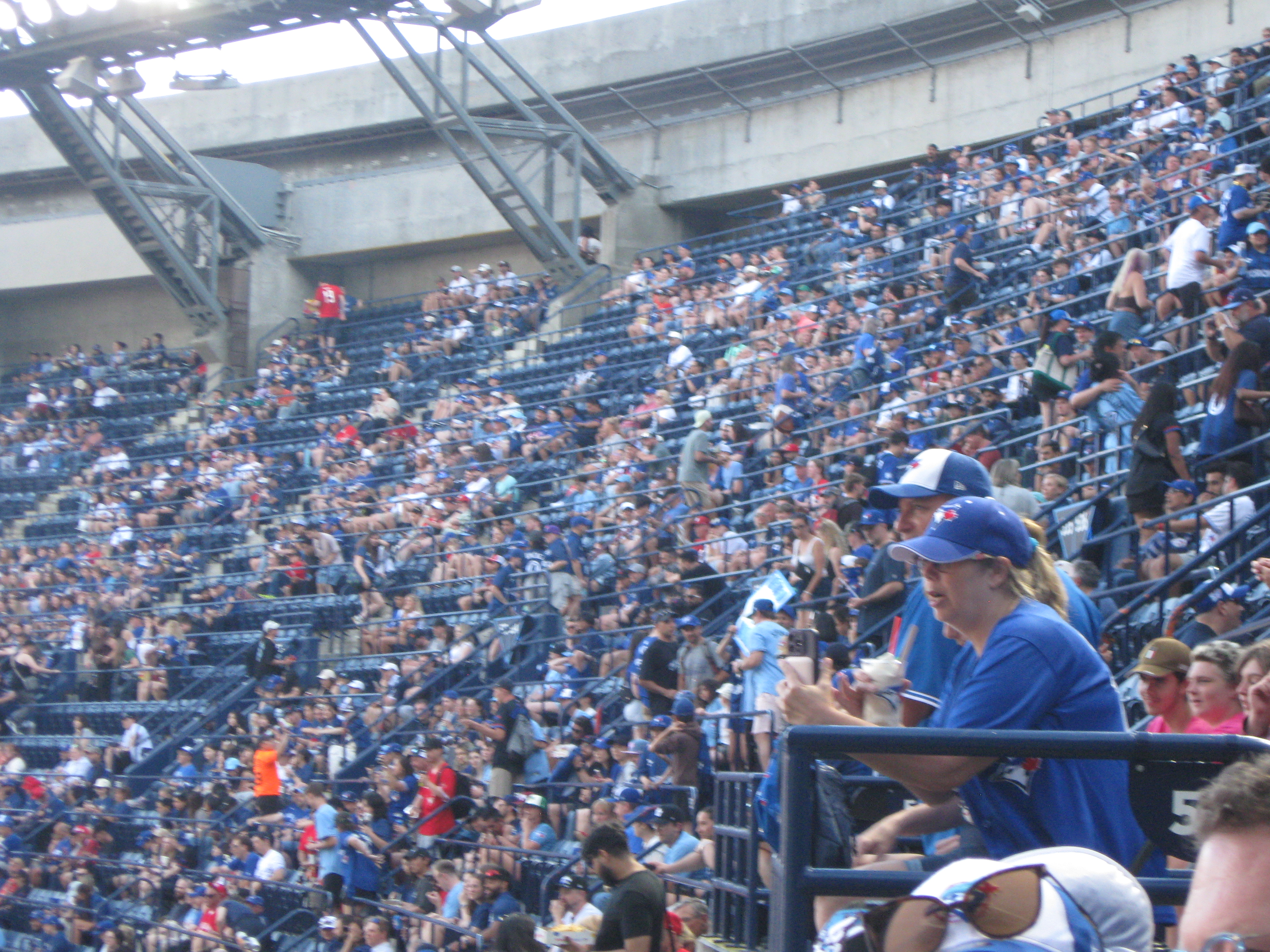 spectators of a baseball game. blue jays versus yankees