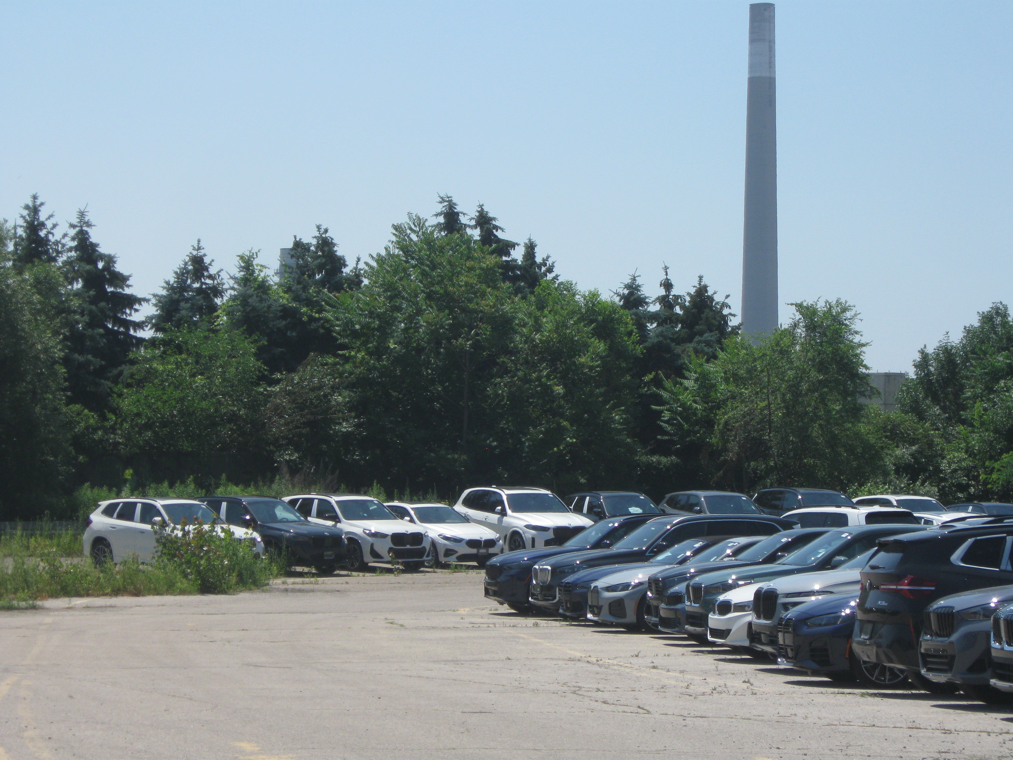 fancy overproduced bmws in the same lot as previous